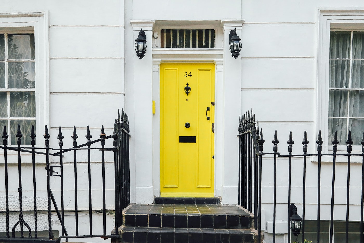A tidy home front door and steps, warm and welcoming